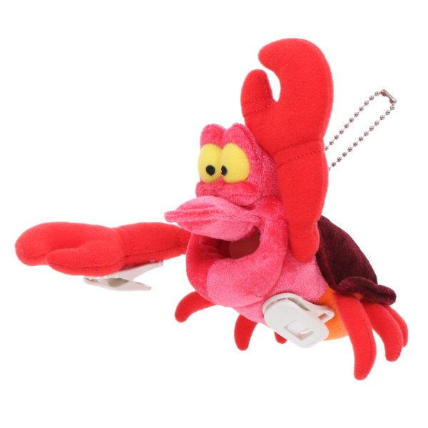 Stuffed toy on shoulder Sebastian