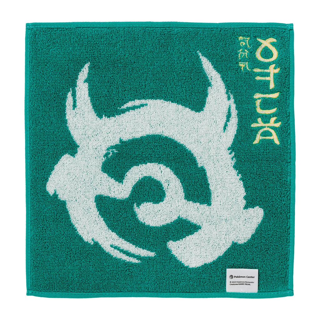 Close-up of Pokemon hand towel with vibrant colors and Japanese packaging