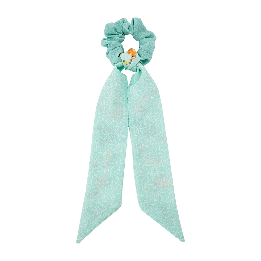 Close-up of Pokemon Ribbon Scrunchy with detailed anime characters from Japan