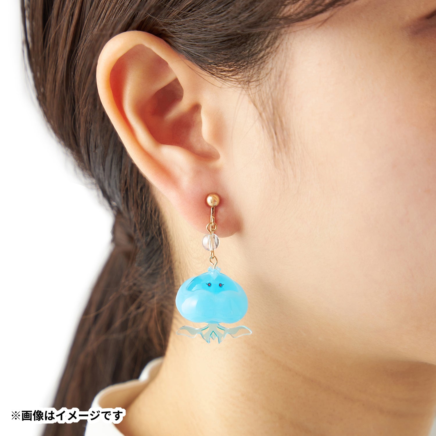 Pokémon 107 Brungel earrings on display, shipped from Japan with care