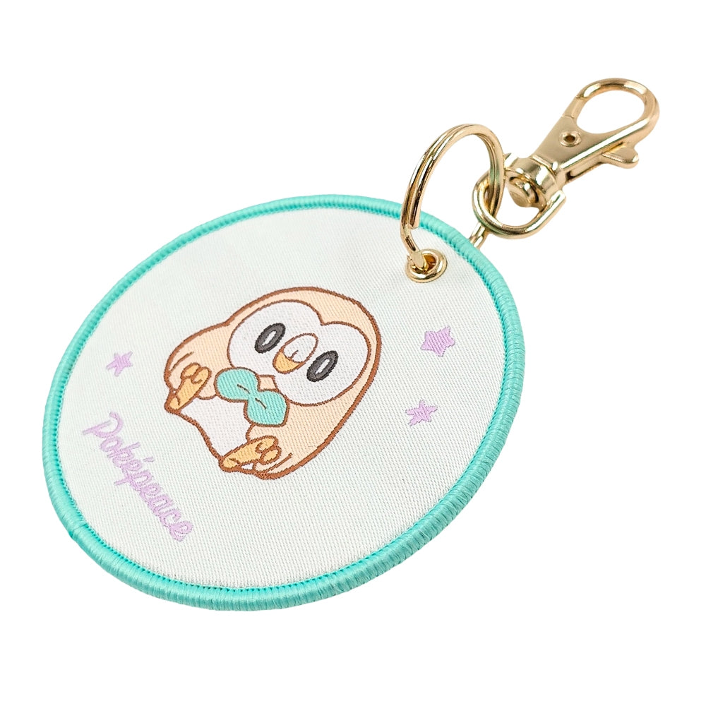 Authentic Japanese Rowlet Keychain with woven texture and Pokemon logo