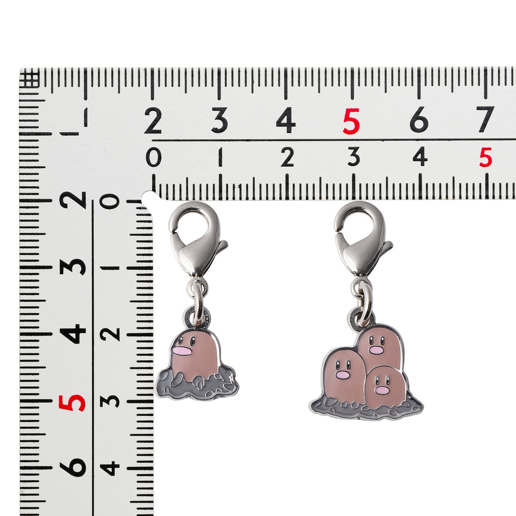 Pokemon Metal Charm 050/051 from Japan, detailed collectible with National Encyclopedia design