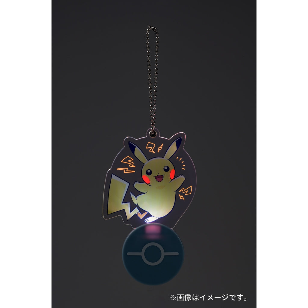 Pikachu charm from Japan, displaying vibrant colors and dynamic pose