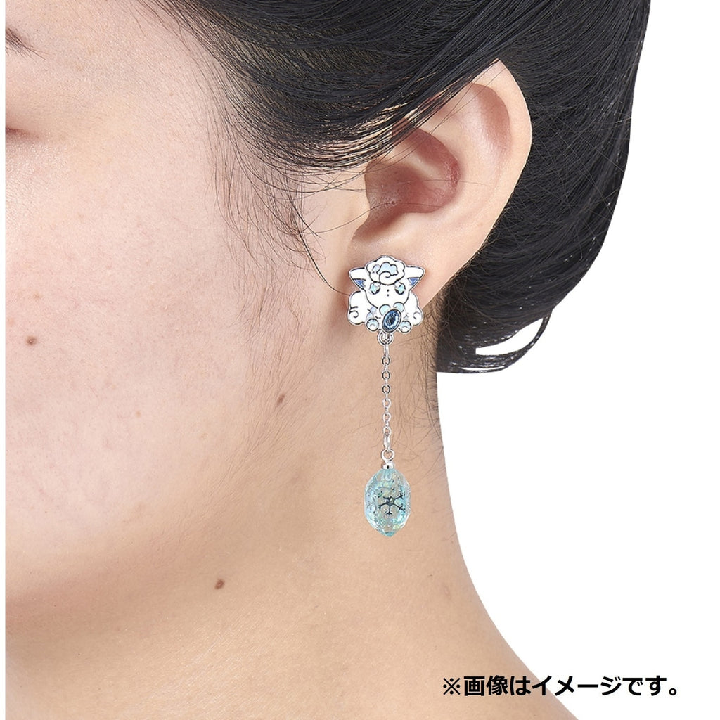 Close-up of Alolan Vulpix earrings with icy blue color from Japan