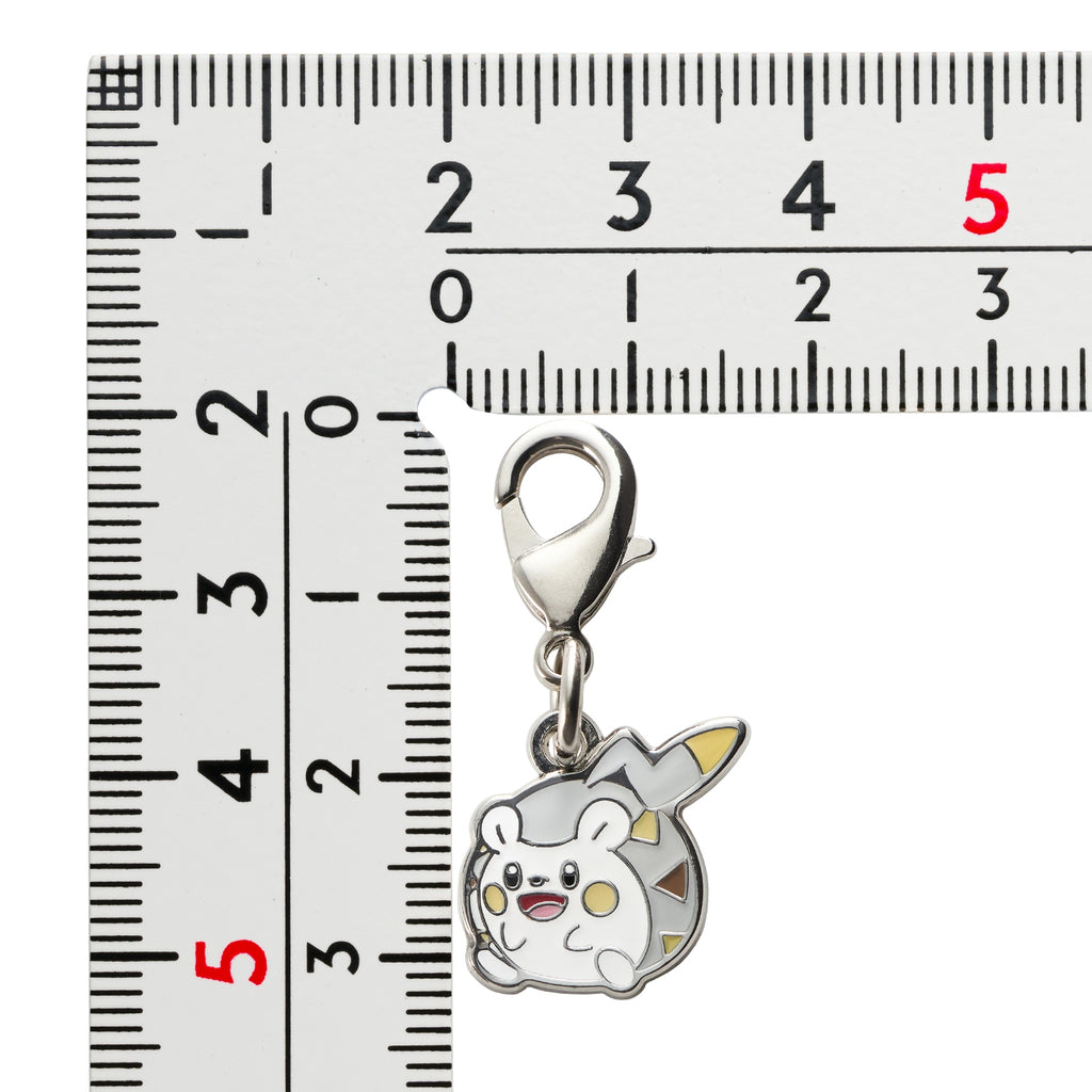Close-up of Metal Charm 777, official Pokemon Center Japan merchandise, sourced from Japan