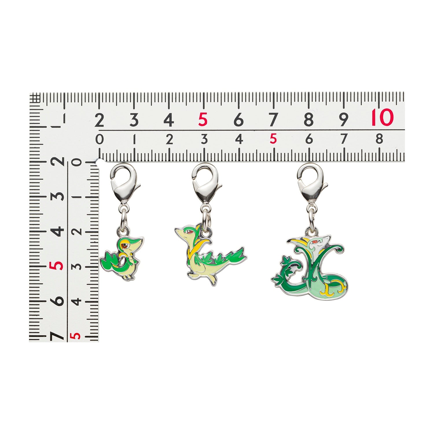 Pokemon metal charm 496 and 497 set from Japan, showcasing intricate details