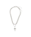 atmos pink Layer Cross Charm Necklace from Japan, featuring intricate cross design