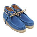 Clarks Wallabee Boot with brown leather upper and rubber sole from Japan
