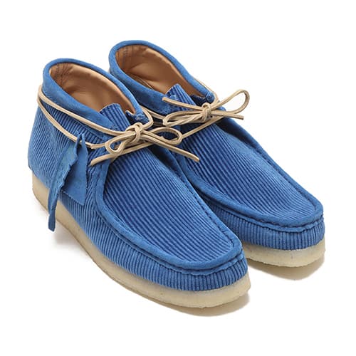 Clarks Wallabee Boot with brown leather upper and rubber sole from Japan