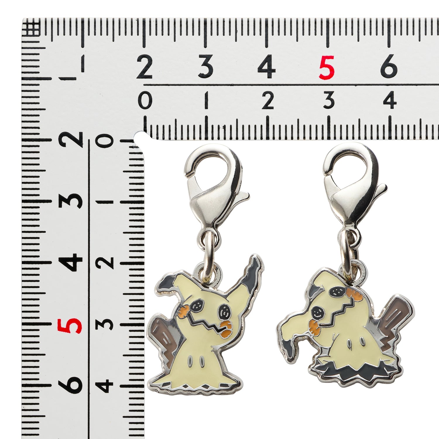 Pokemon Metal Charm, a licensed collectible item with intricate design from Japan