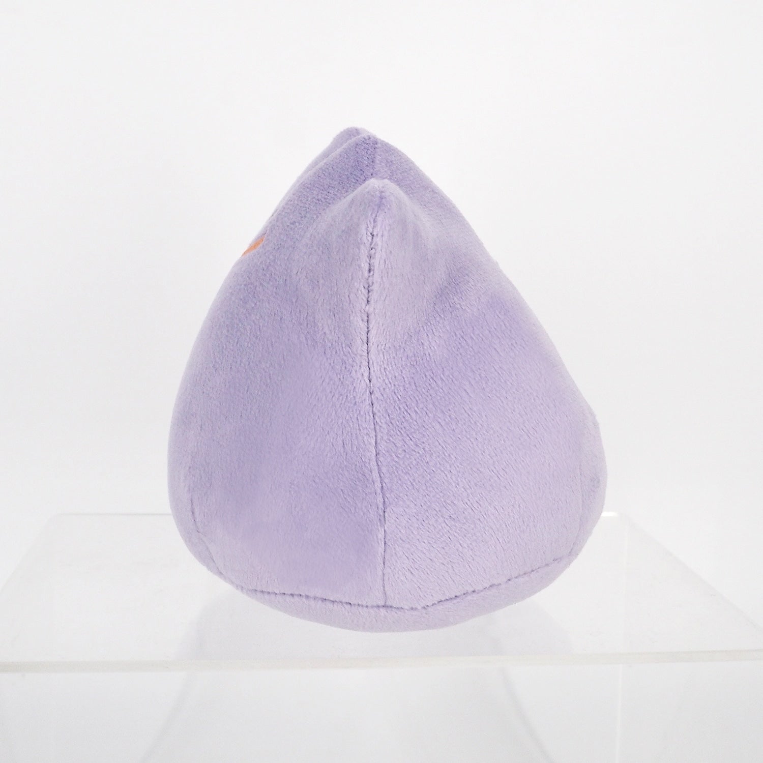 Authentic Metamon stuffed toy, front view with bright colors