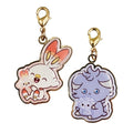 Metal charm set Hibani & Nyasper from Japan, featuring Scorbunny