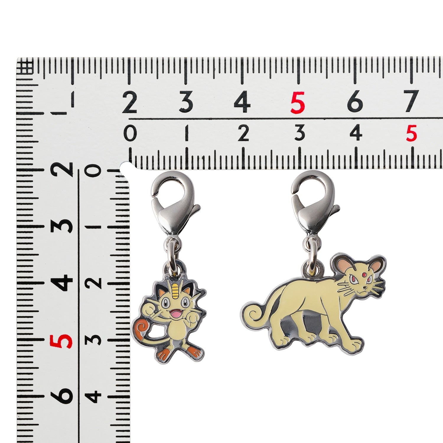 Pokemon Metal Charm 052/053 with unique design elements, sourced from Japan