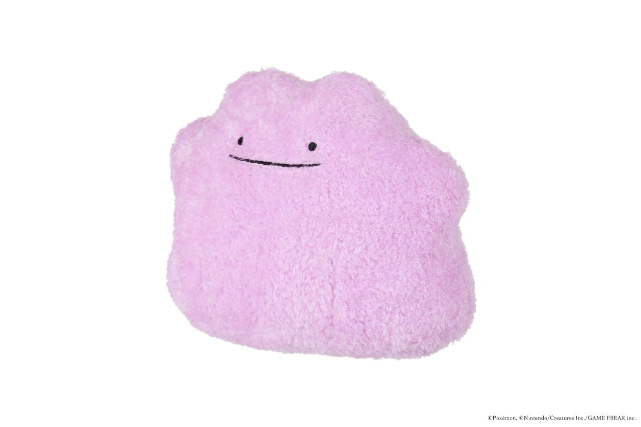 Metamon plush toy sitting down with soft white belly from Japan