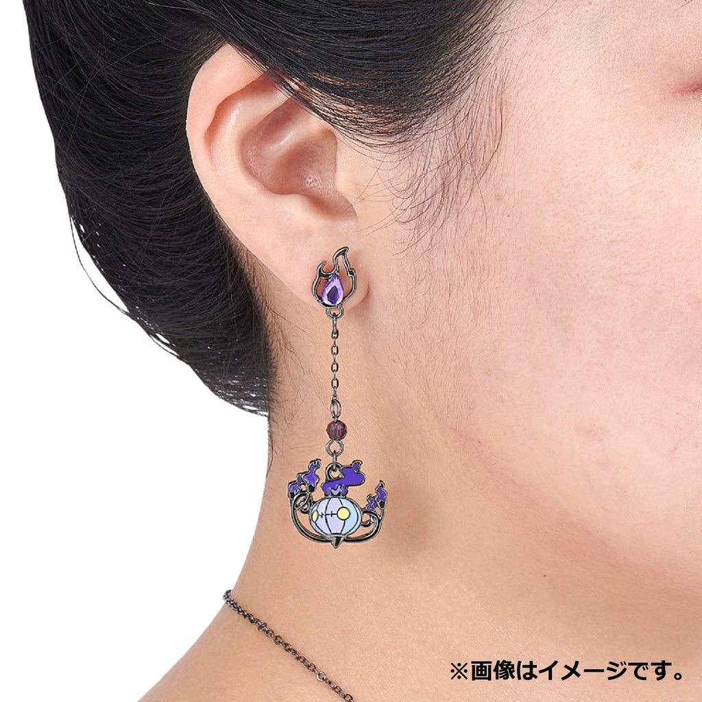 Close-up of SHINKA NO ISHI Rampler & Yami no Ishi Pokemon earrings, Japan made