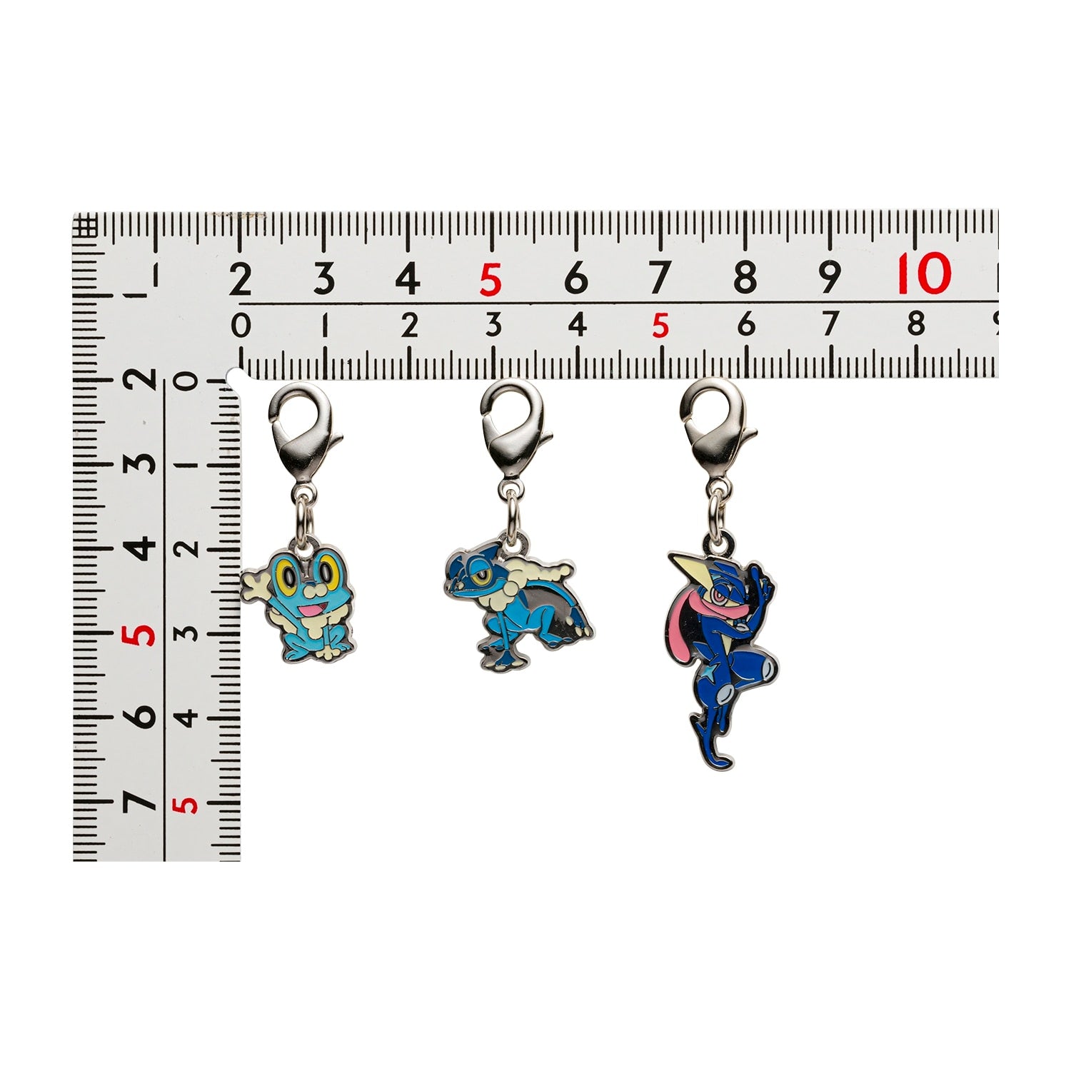Pokemon Metal Charms 657 and 658, authentic Japanese collectibles with official licensing