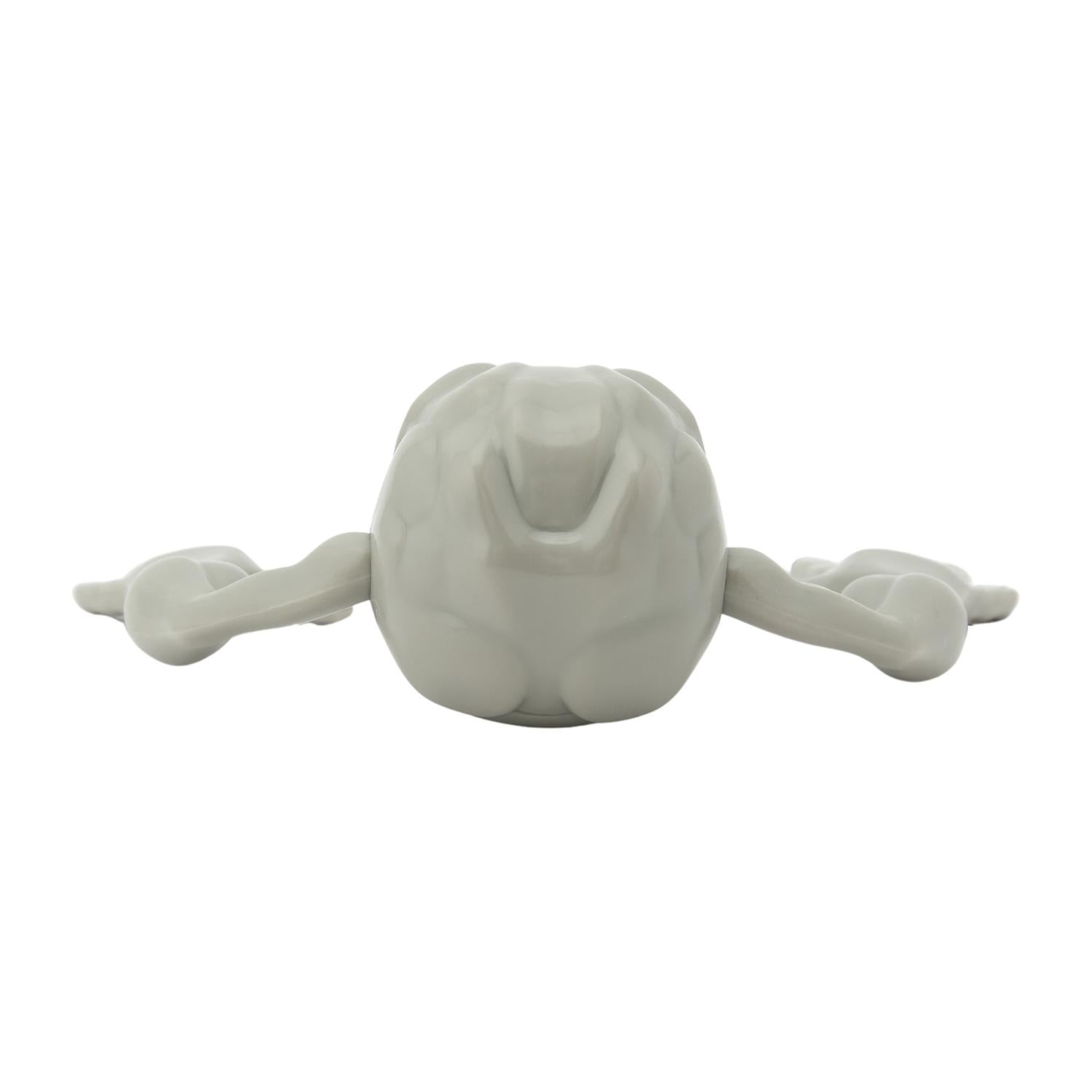 Pokemon CAVE DWELLER paperweight on a desk with Japanese packaging