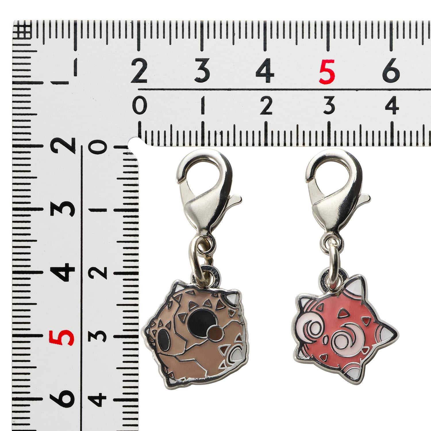 Authentic Pokemon Metal Charm from Japan, showcasing a unique anime-style collectible with intricate details