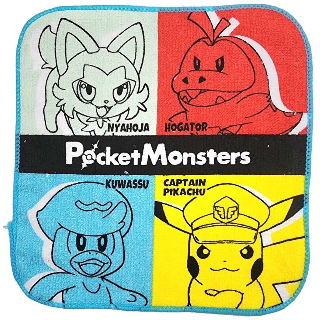 Close-up of red petit towel with Pokemon logo and Japanese design