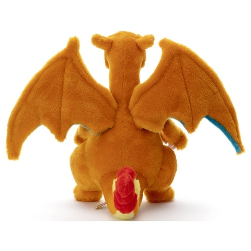 Close-up of Charizard plush toy's face, vibrant colors and Japanese quality