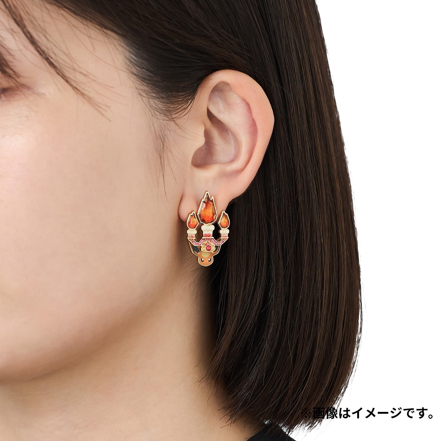 Pokémon Earrings Japan, featuring booster pack and anime characters