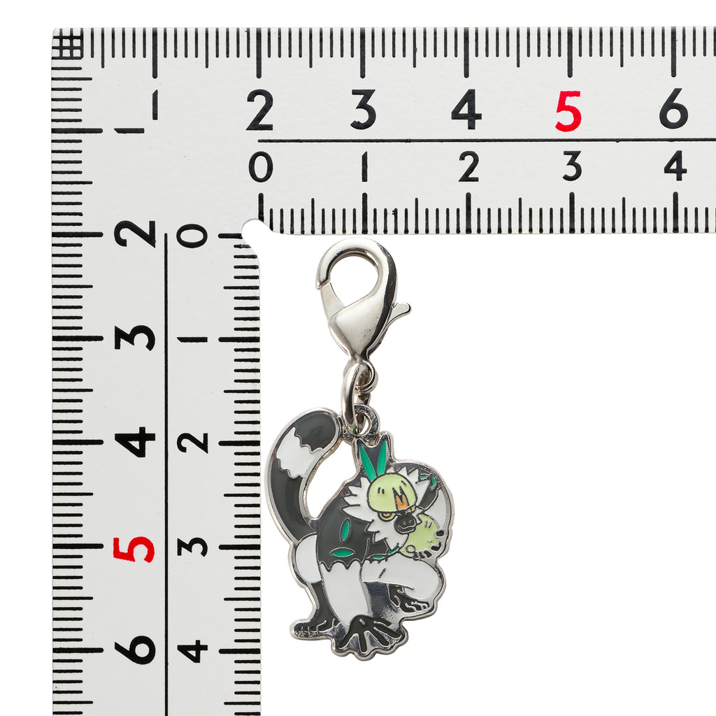 Pokemon Metal Charm from Japan, showcasing a collectible figure with vibrant colors