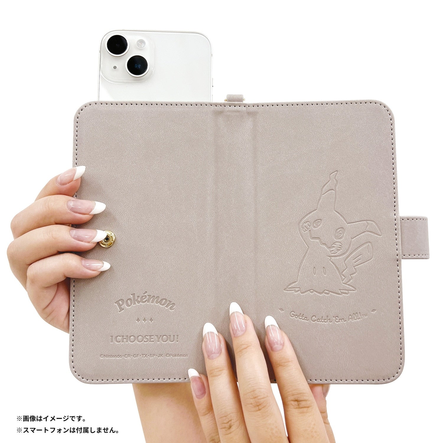 Collectible Mimikyu case from Japan with embossed details and fairy type symbol