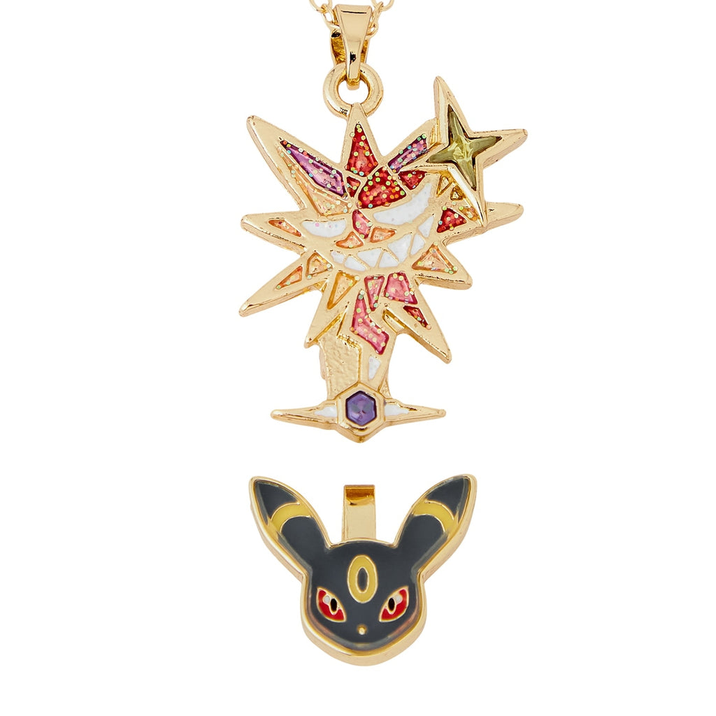 Close-up of Pokémon necklace pendant with detailed anime character from Japan