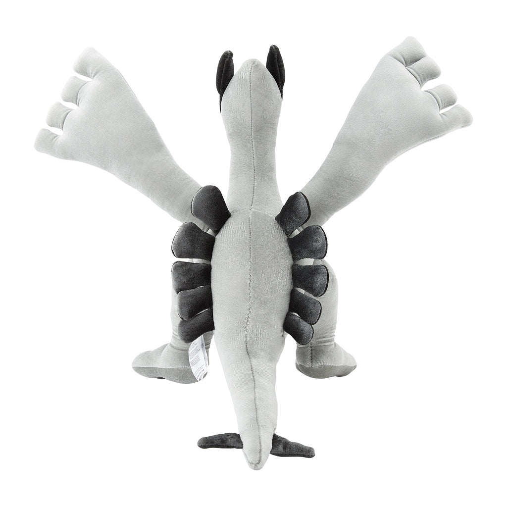 Japanese Lugia silver plush toy, close-up of face and silver details, authentic collectible