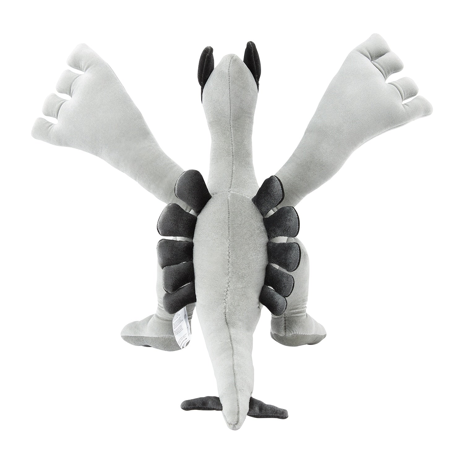 Japanese Lugia silver plush toy, close-up of face and silver details, authentic collectible