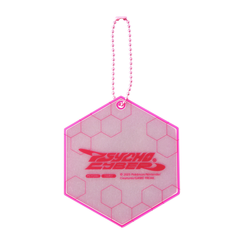 Pokemon Reflector keychain on display with other Japanese collectibles