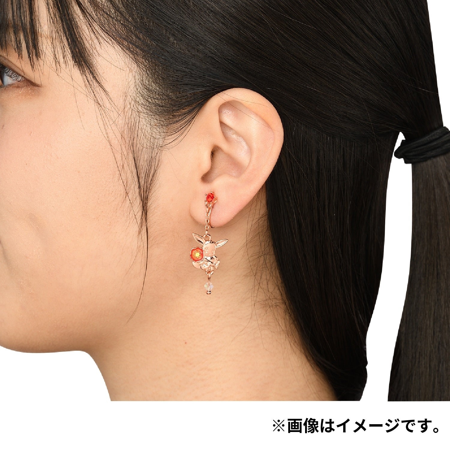 Authentic Japanese Pokemon earrings featuring Eevee and poppy
