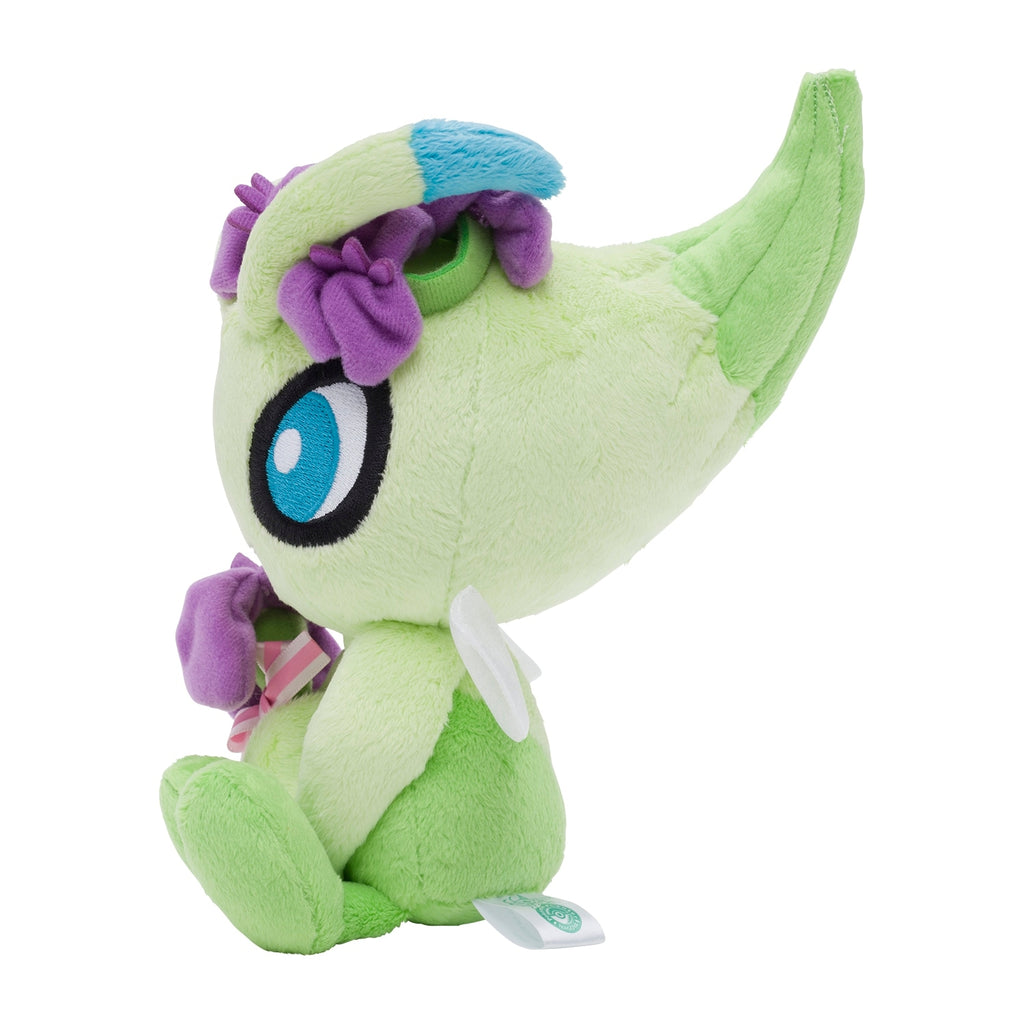 Plush Celebi Pokemon figure from Japan, sitting pose with happy expression