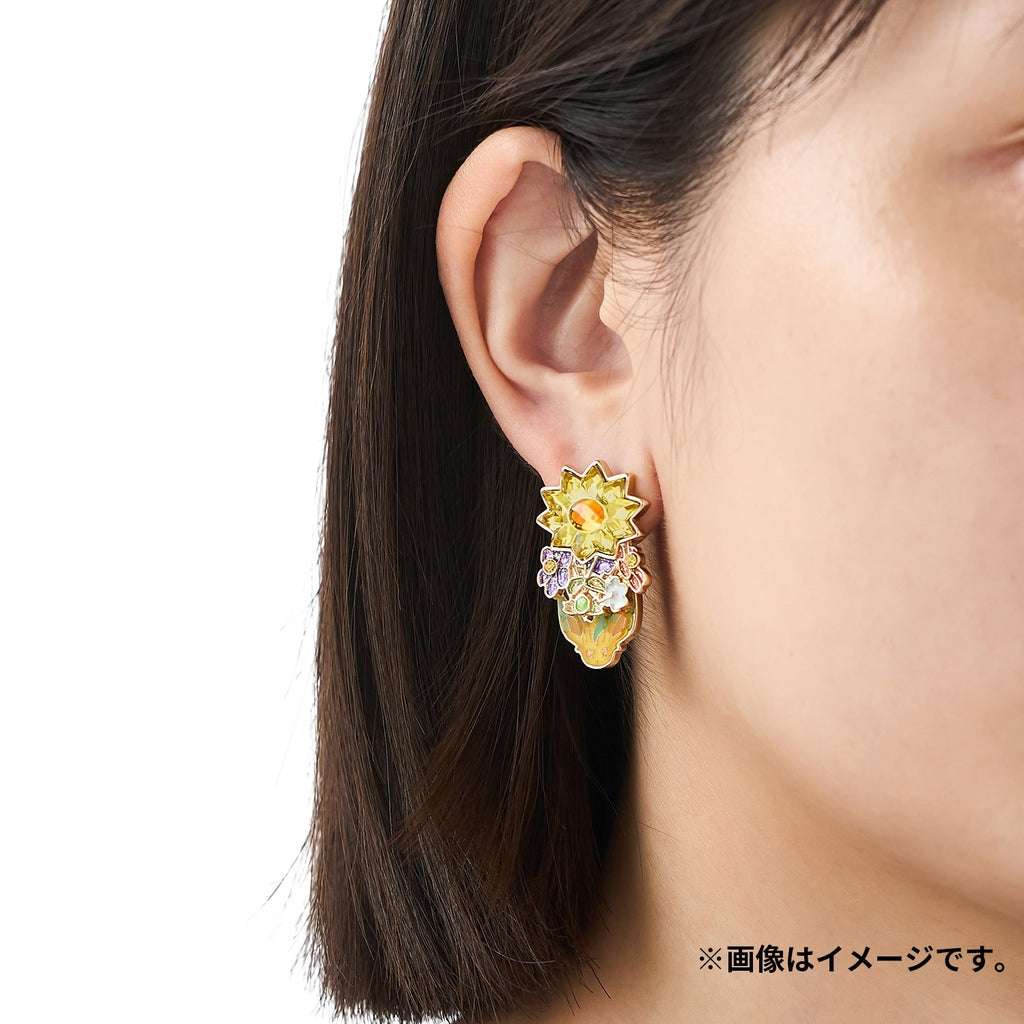 Pokémon Leafeon earrings on display with Japanese packaging from Japan