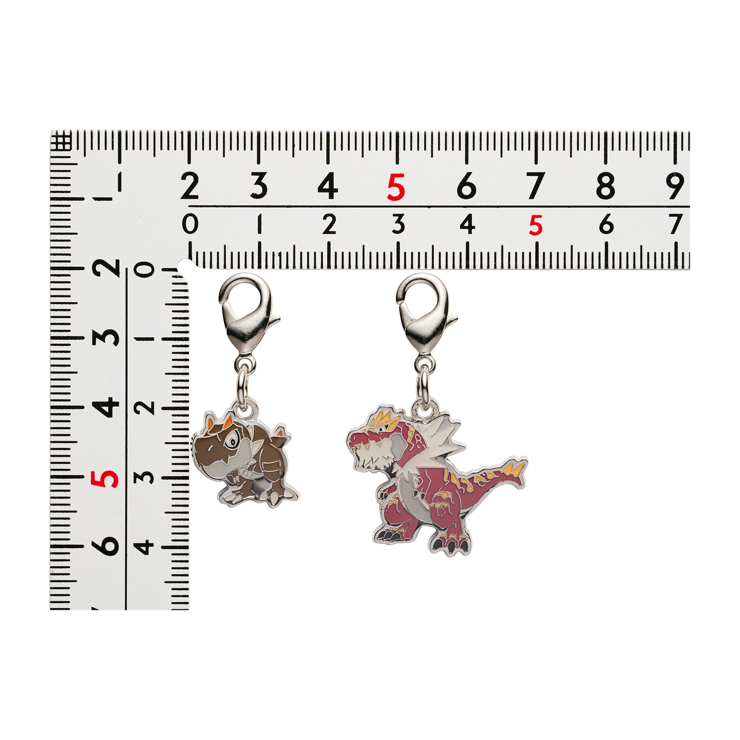 Authentic Pokemon Metal Charm 696/697, officially licensed by Pokemon Center Japan, with intricate details