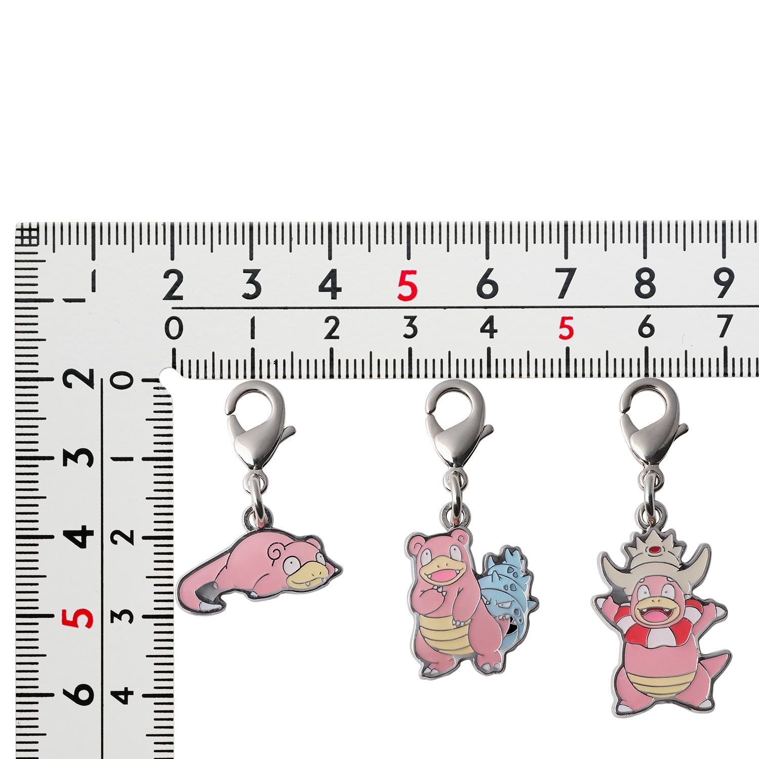 Official Pokemon Center Japan metal charm, featuring Pokédex entry 199, sourced from Japan