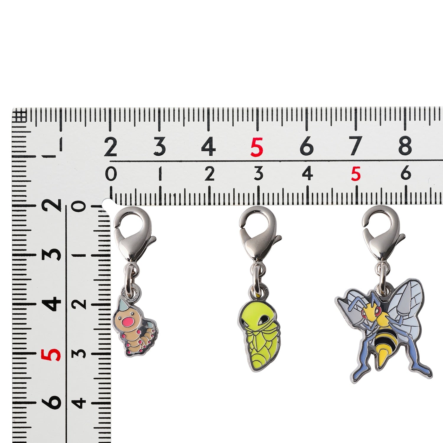 Official Pokemon Center Japan Metal Charm 013/014/015, showcasing authentic Japanese packaging and collectible item