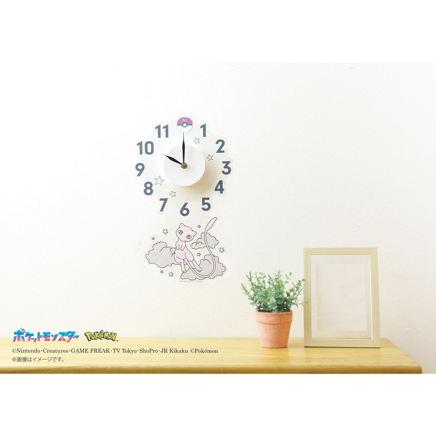 Close-up of Mew wall clock sticker, officially licensed by Pokemon Center Japan