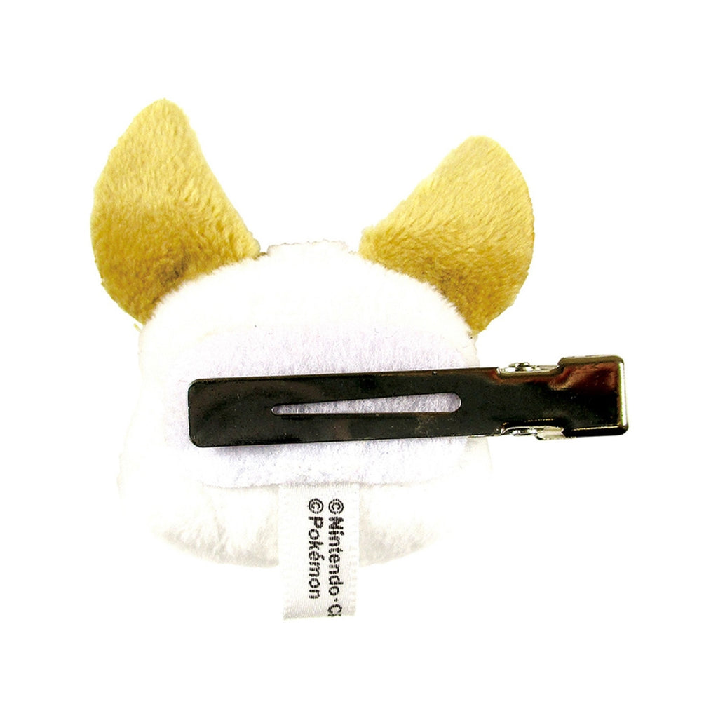 Close-up of Yamper's face on the hair clip, made in Japan