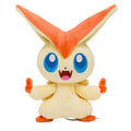 Victini plushie from Japan with bright orange and yellow details