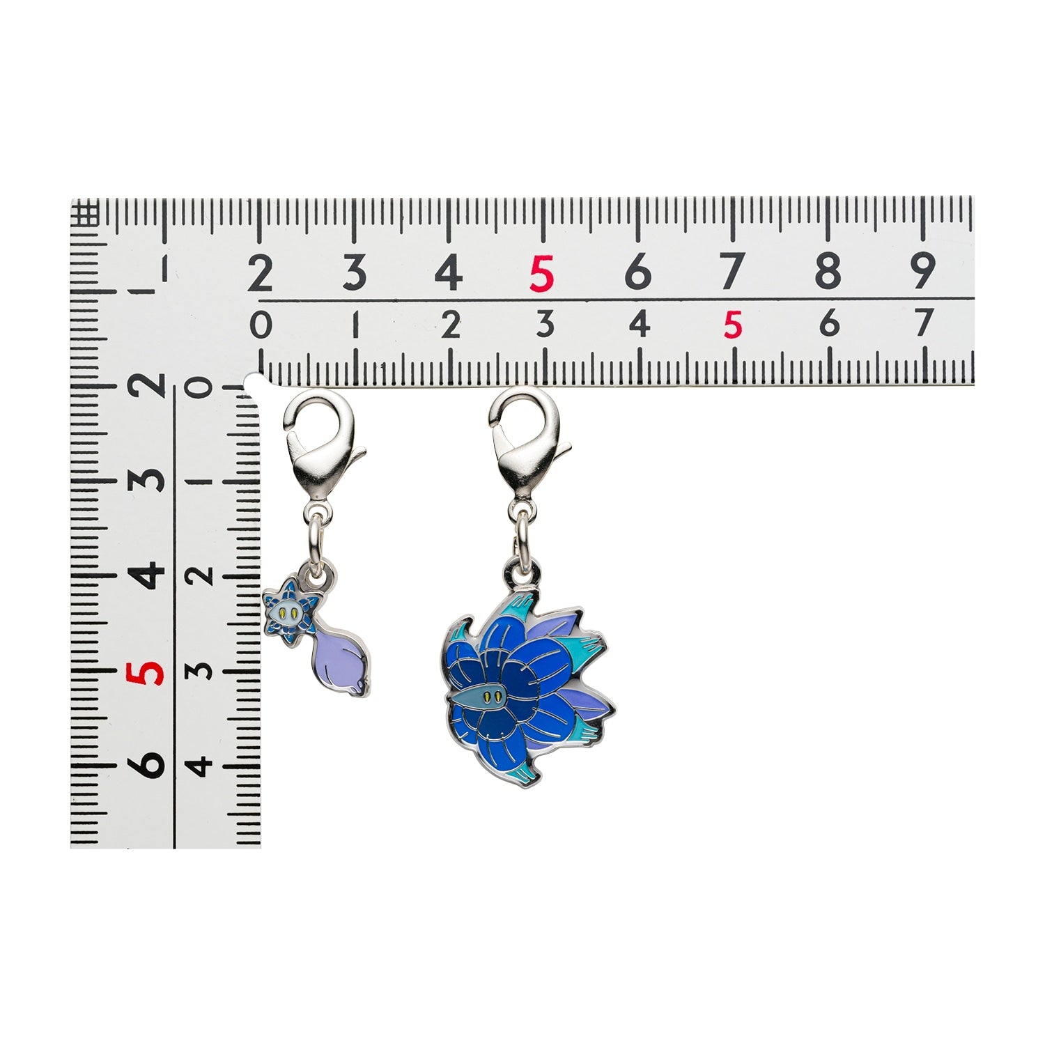 National Encyclopedia Metal Charm from Japan, featuring vibrant anime artwork