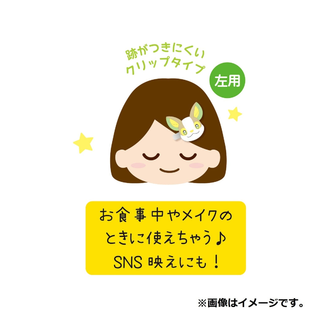 Yamper hair clip on a person's hair, showcasing its size and detail from Japan