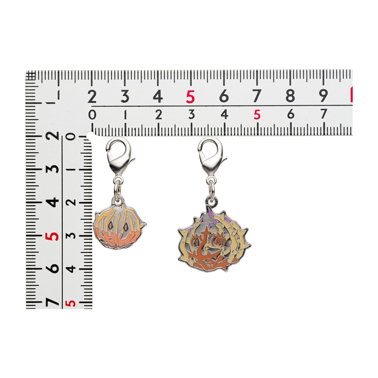 Pokemon Metal Charm collectible item from Japan, with intricate design and official logo