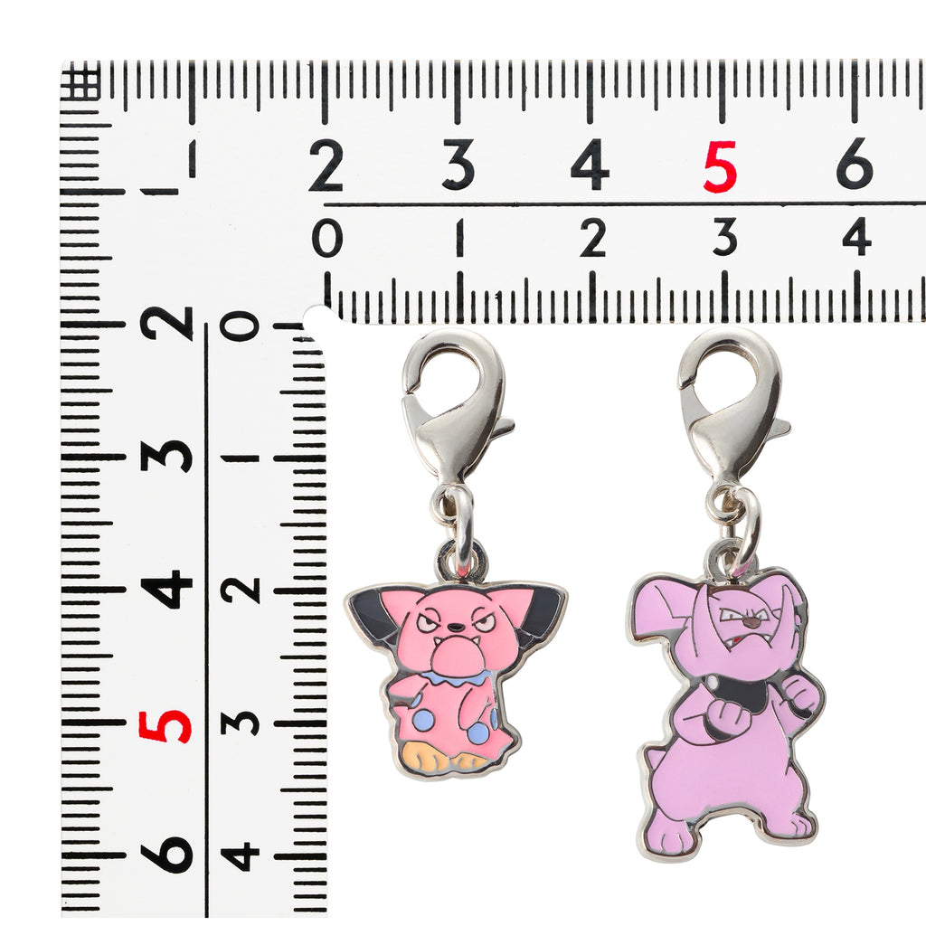 National Encyclopedia metal charm 210 Snubbull from Japan, showcasing detailed metalwork and authentic Pokemon Center packagi