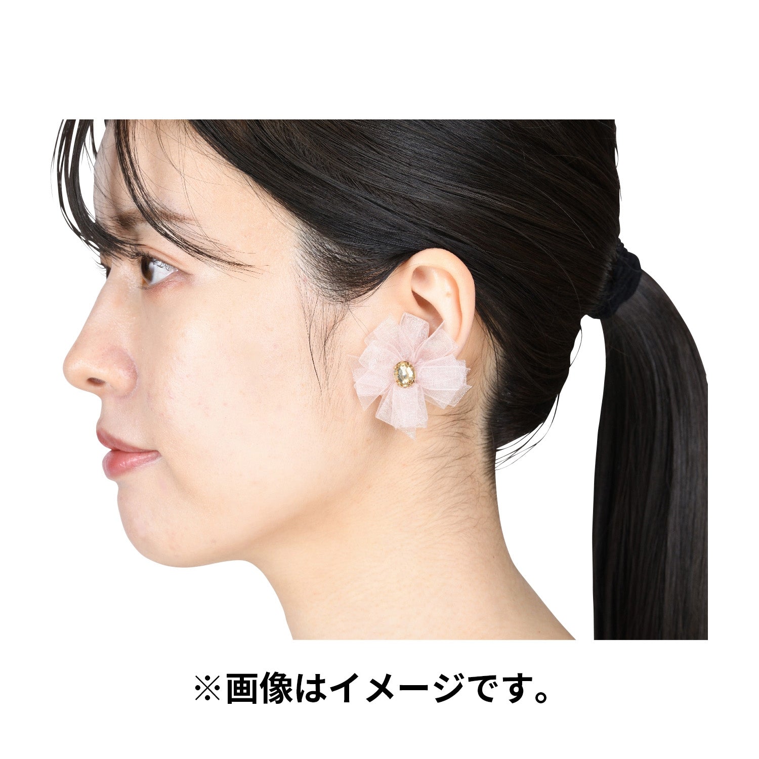Back view of Pokémon Accessory Earrings with authentic Japan logo