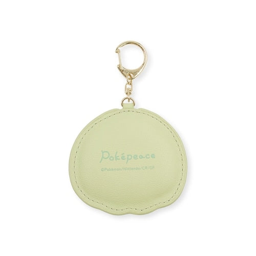 Close-up of Rowlet keychain with official Pokemon Center Japan artwork