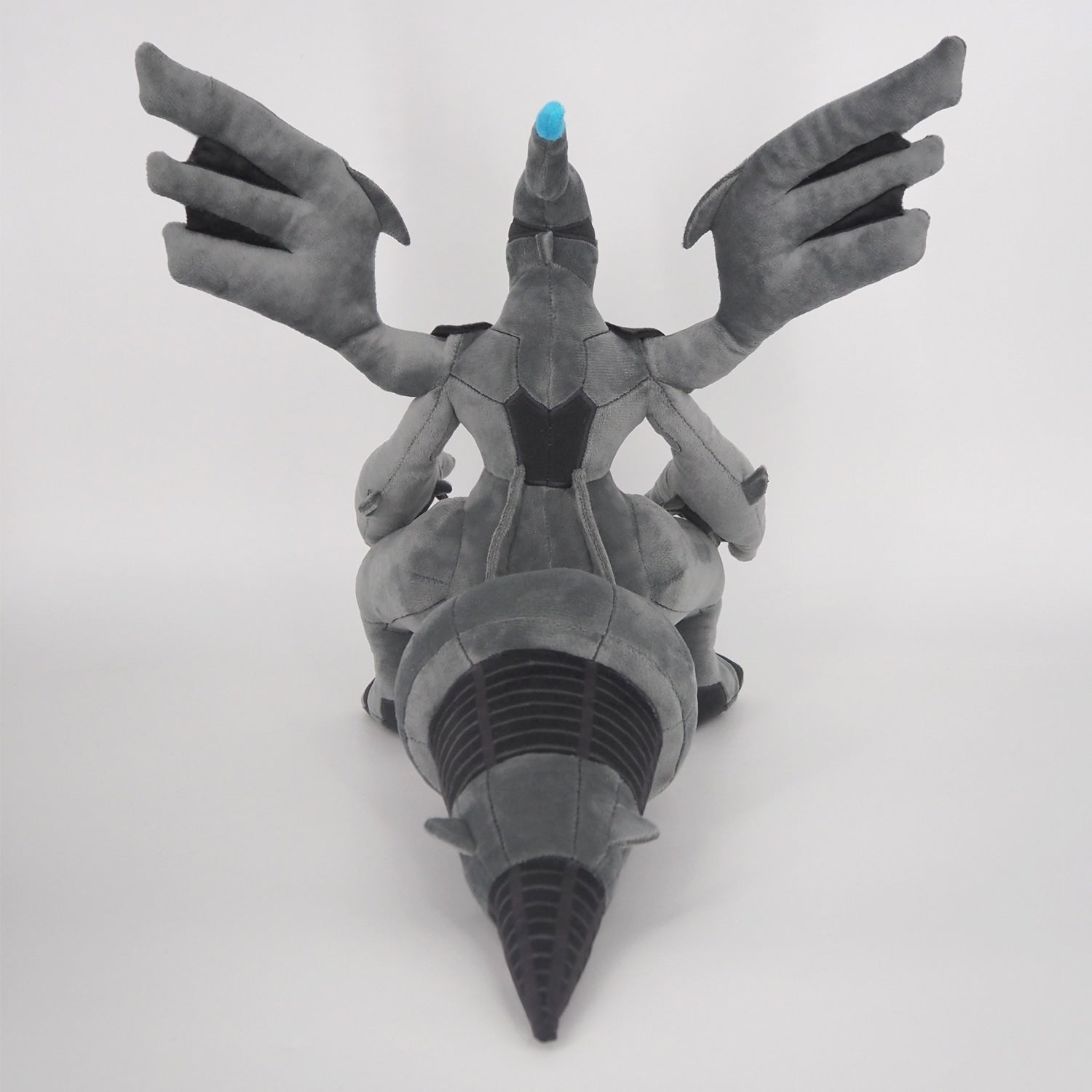 Japanese Zekrom toy, back view with Pokemon logo