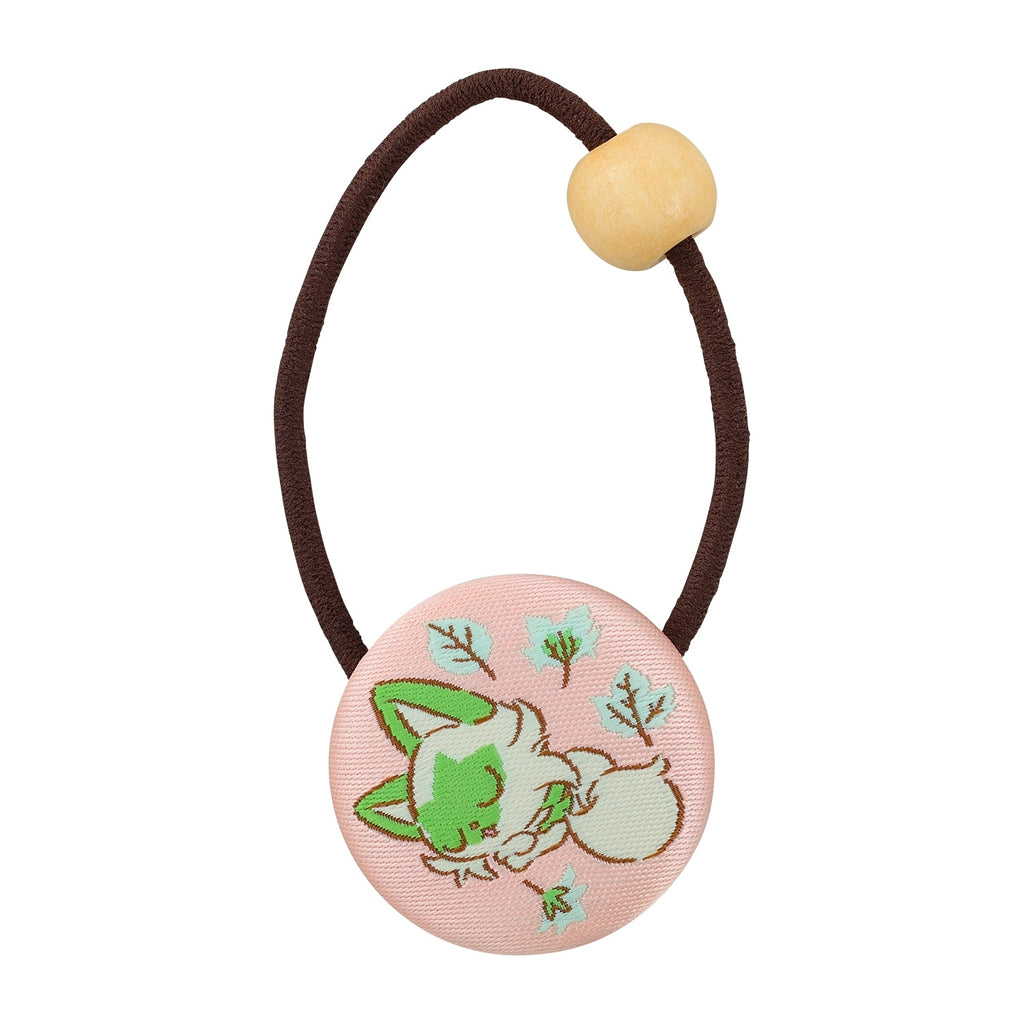 Walnut peony hair tie from Japan, featuring pink peony design