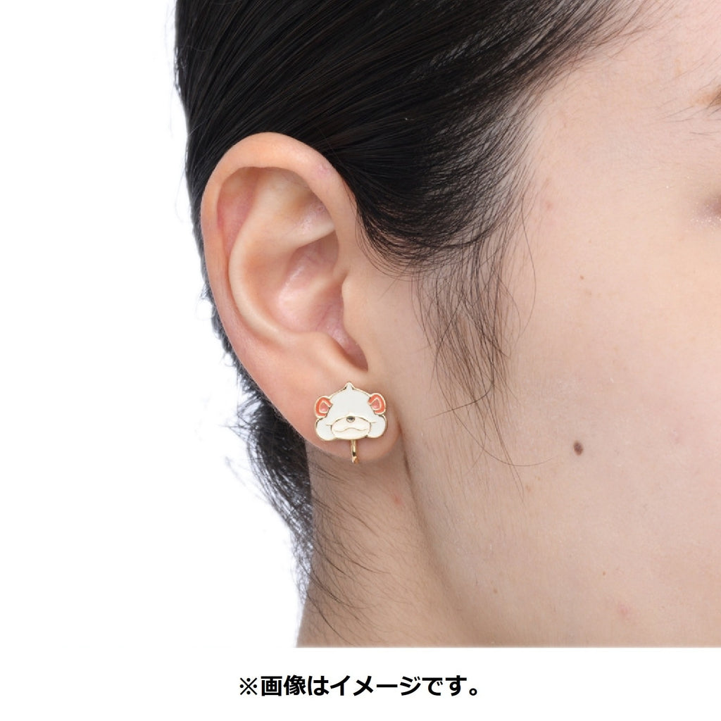 Close-up of Pokémon Earrings, showcasing Jade Guardi's face, Japanese collectible