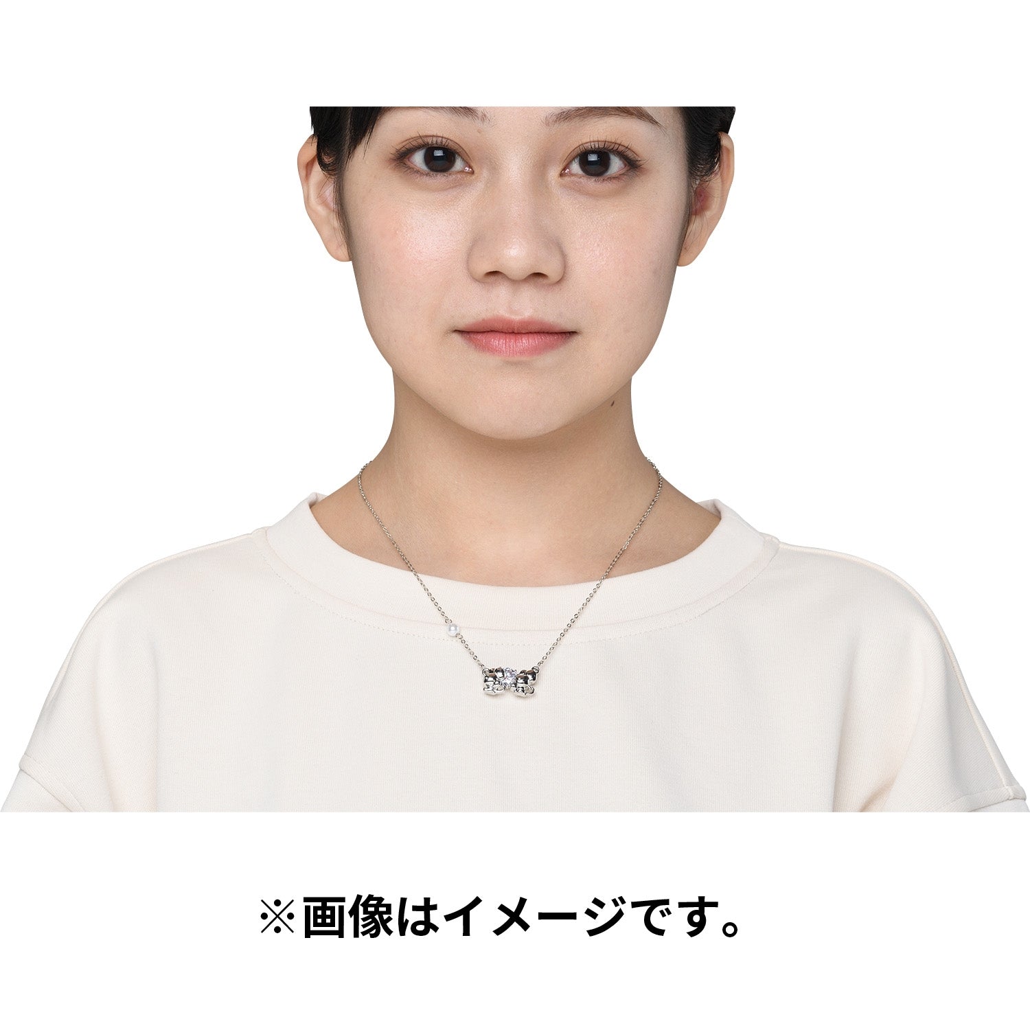 Close-up of Pokemon Necklace WAKKA de IKKA with detailed design and Japan import mark